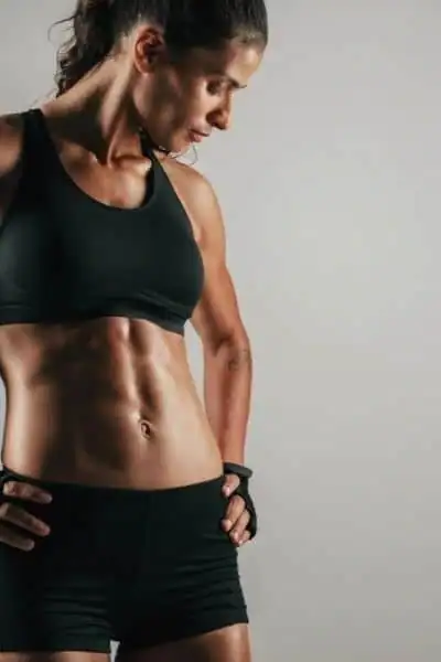 Toning Up at Home: The Ultimate Guide to Bodyweight Exercises 2 Image of woman's toned stomach after bodyweight exercises Borehamwood and non-surgical treatment from Lipo 360