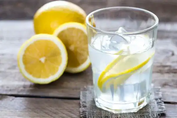 Hydration: The Secret Ingredient for a Toned Stomach and Enhanced Fitness 2 Image of lemon water to aid hydration Borehamwood