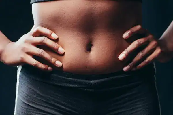 Toning Your Stomach: The Ultimate Guide to Achieving a Sculpted Stomach While Shedding Pounds 1 Image of a toned stomach after non surgical treatment Borehamwood